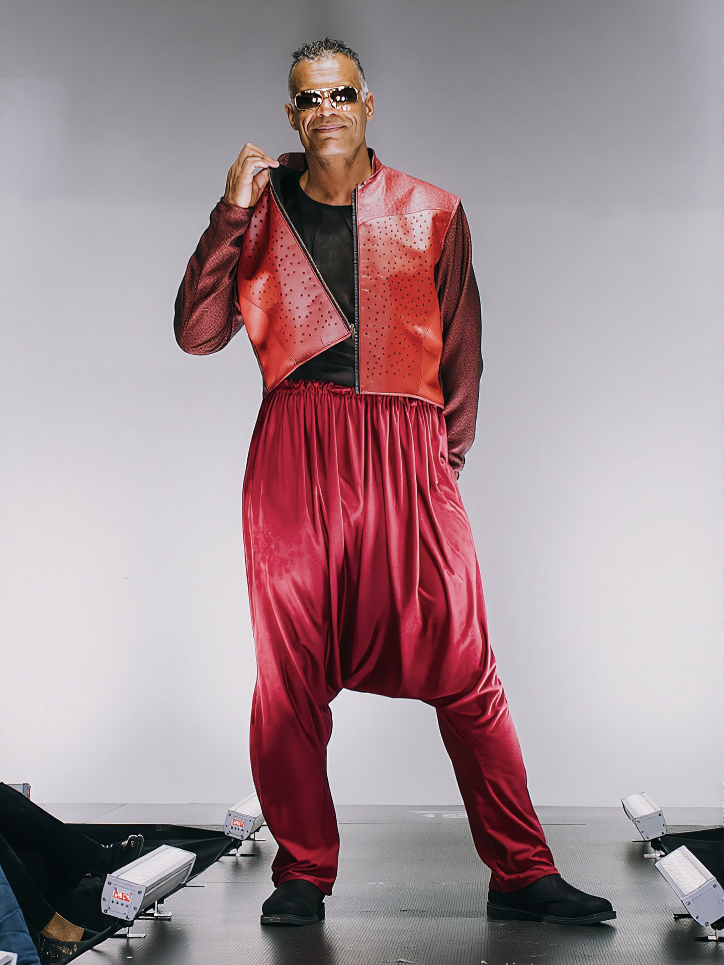 Kristopher in a full red leather ensemble.