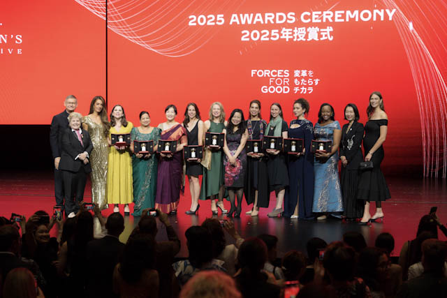 Award recipients holding trophies on stage at the 2025 Awards Ceremony